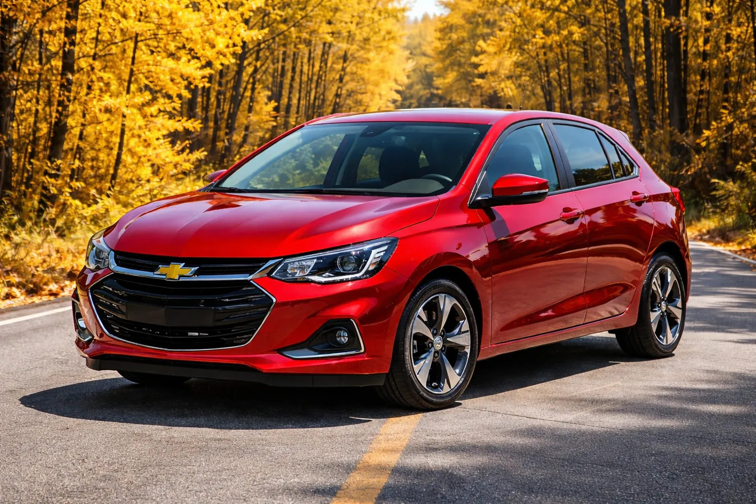 Chevrolet Onix em estrada de outono