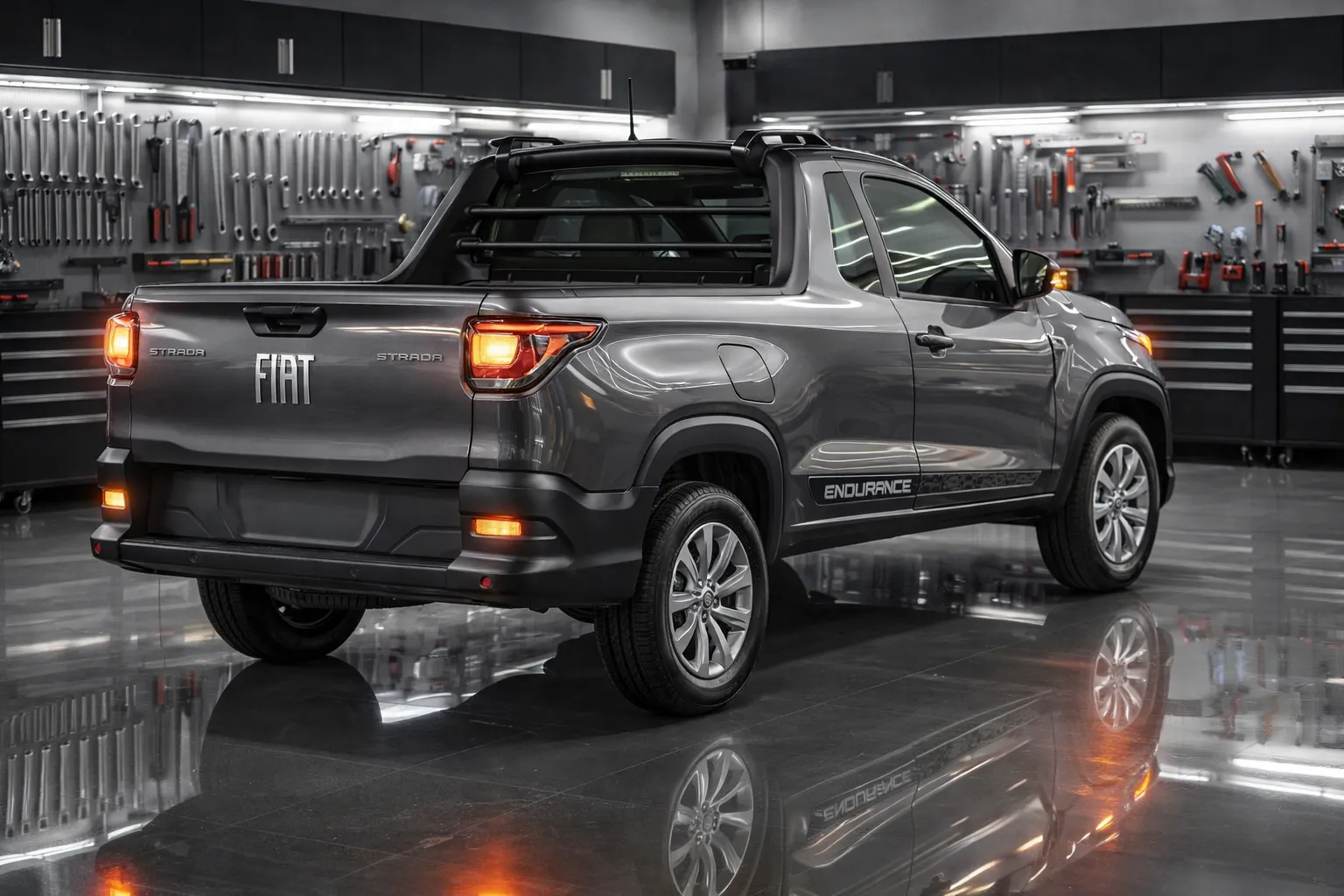 Fiat Strada na oficina à noite