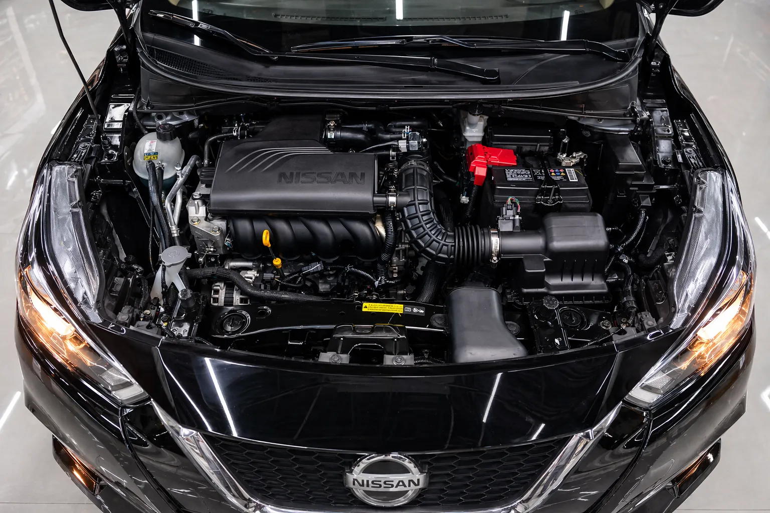 Motor HR16DE 1.6 do Nissan Versa 2023 em foco técnico