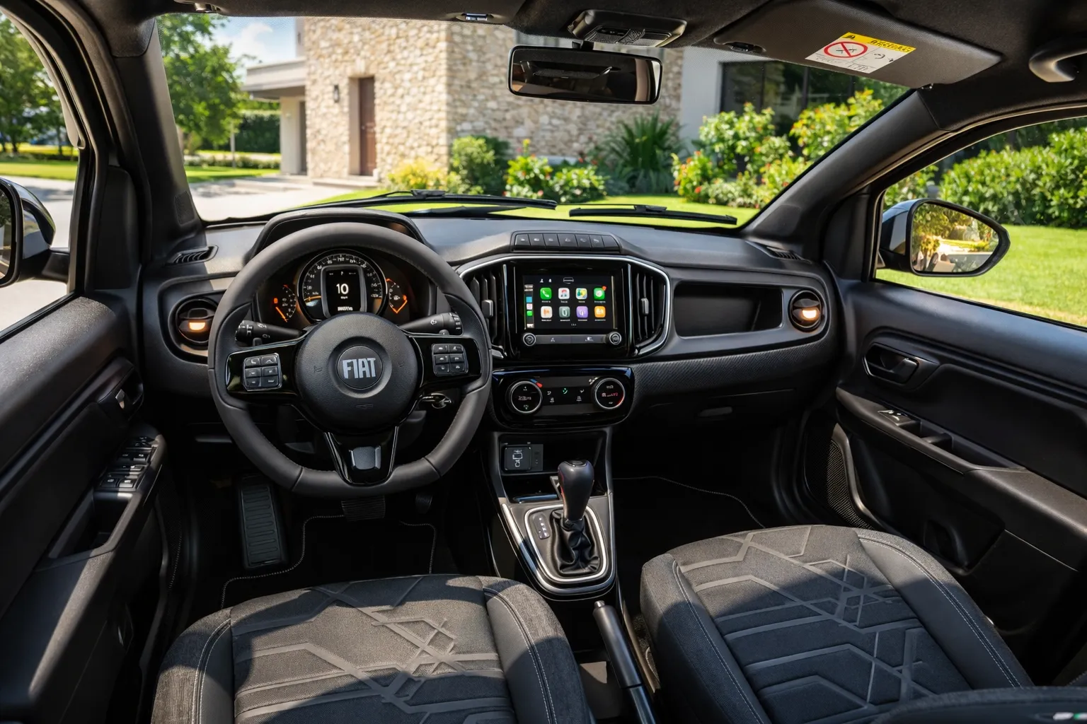 Interior do Fiat Strada 2023 ao sol