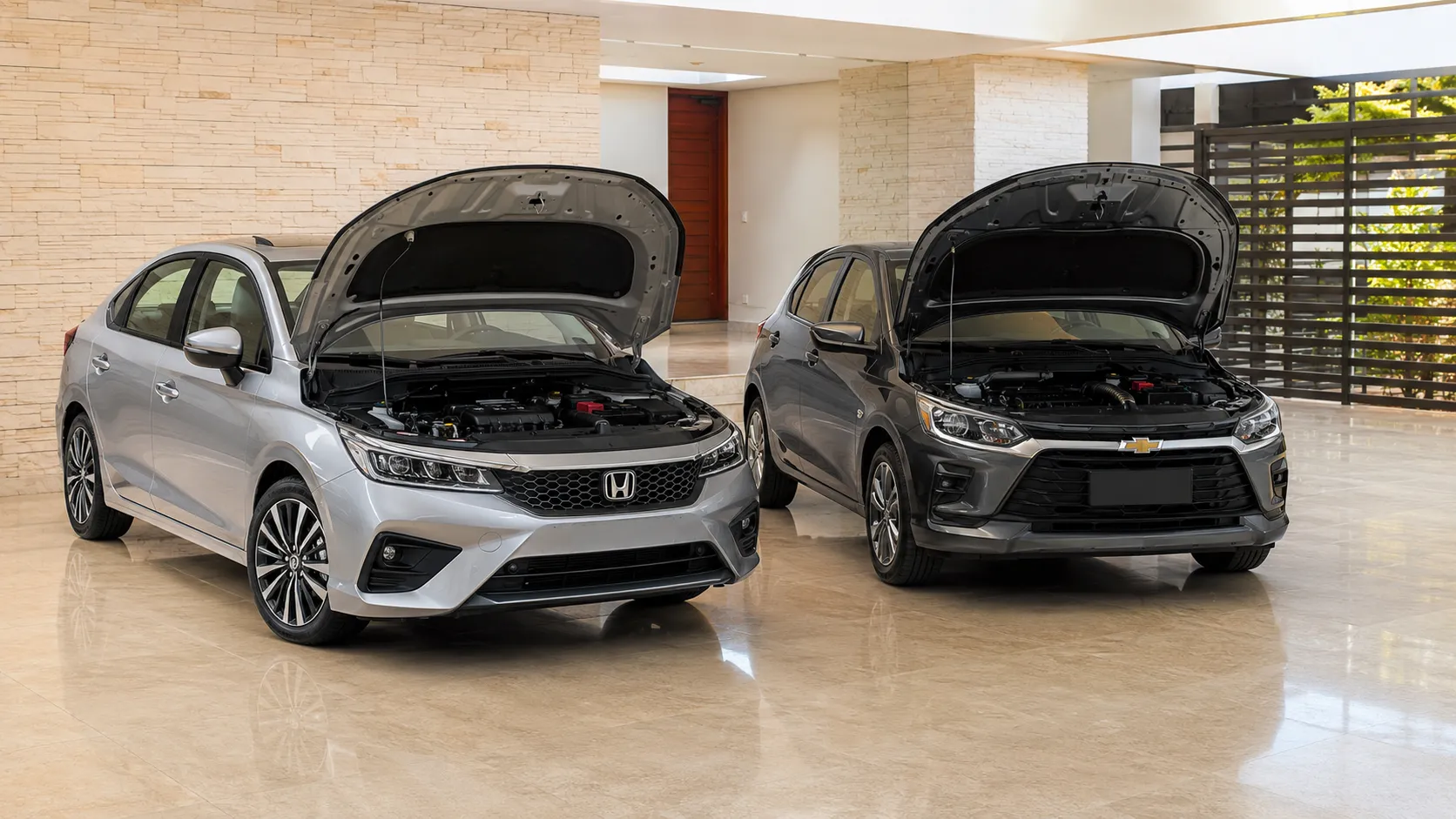 comparativo-de-carros-zero-km-onix-turbo-at-vs-city-hatch-lx
